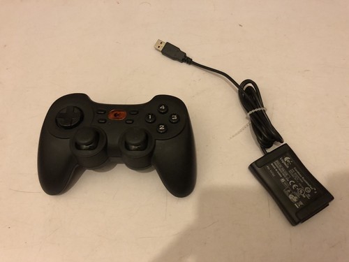 Logitech cordless rumblepad - logitech,