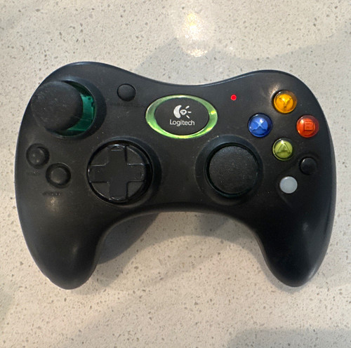 Logitech cordless rumblepad - logitech,